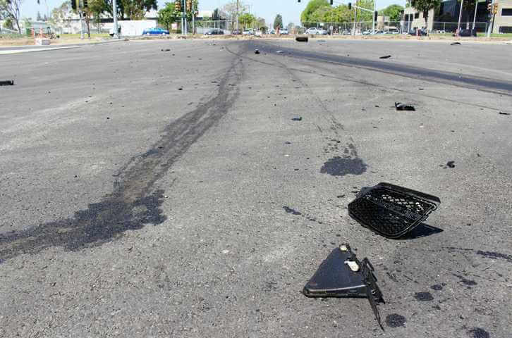 How can tire marks in the road determine who is at fault in a crash?